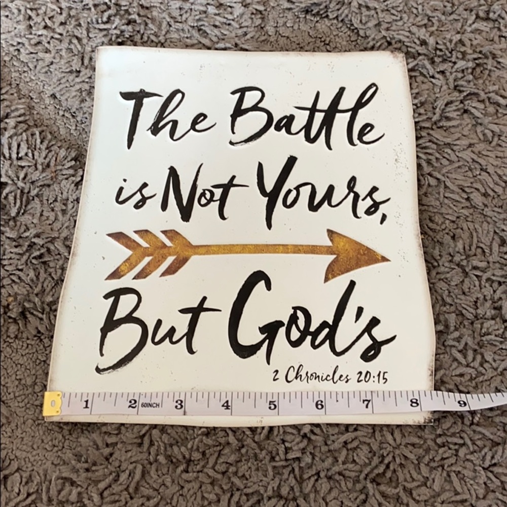 Metal inspirational quote plaque.